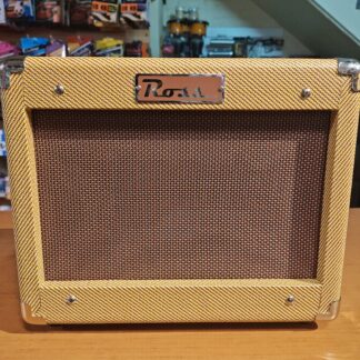 Amplificador guitarra eléctrica marca ROSS,modeloV15G,con distorsión,salida auricular,medios agudos y graves
